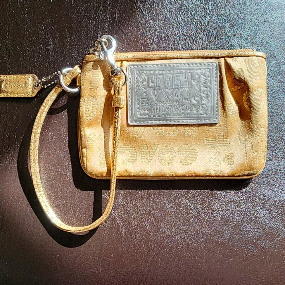 Gold metallic coach poppy wristlet